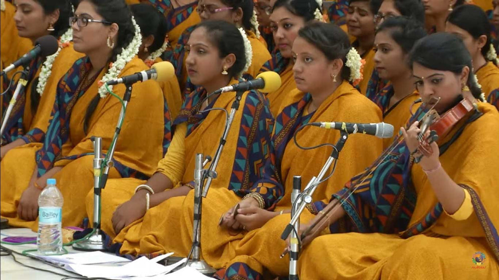 Devotees of Sri Sathya Sai Baba from Mauritius donned in Uniform Sarees from www.uniformsarees.in at Puttaparthi